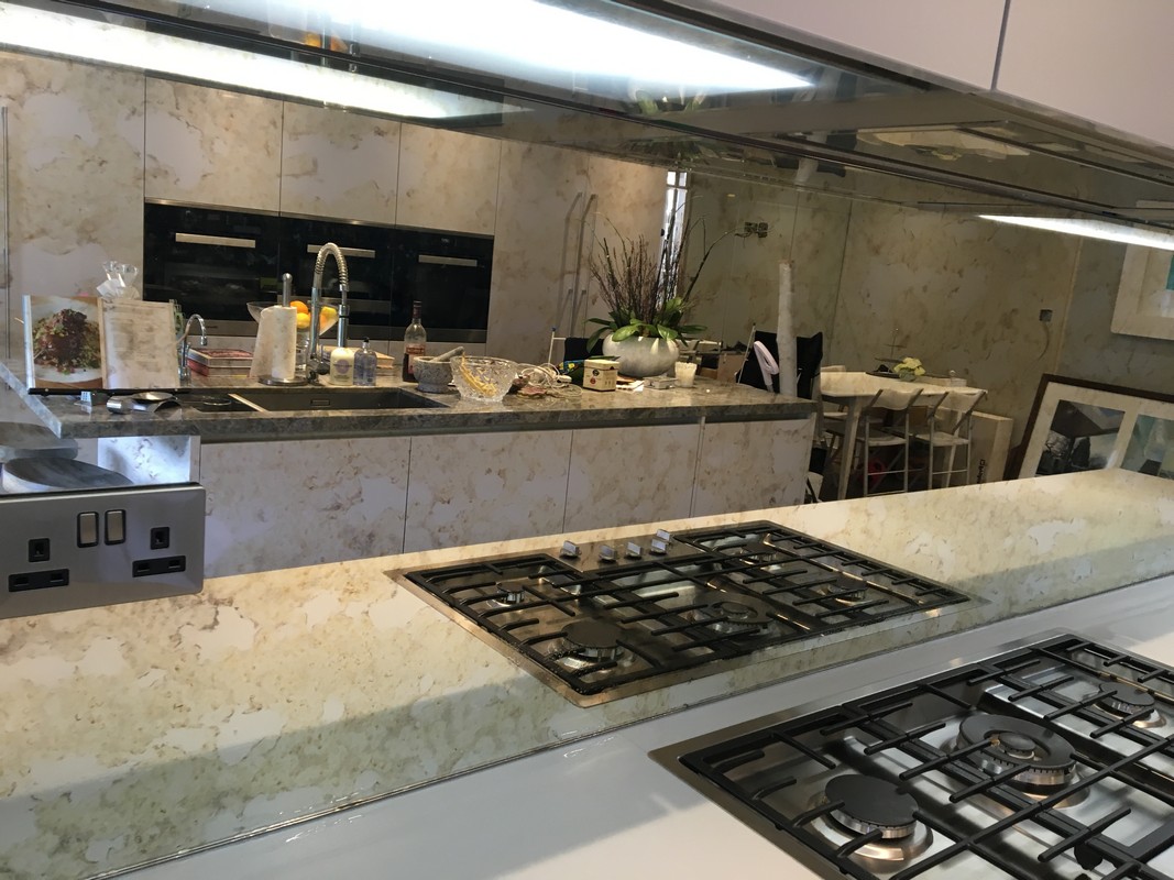 Mirror glass splashback in Coulsdon luxury kitchen